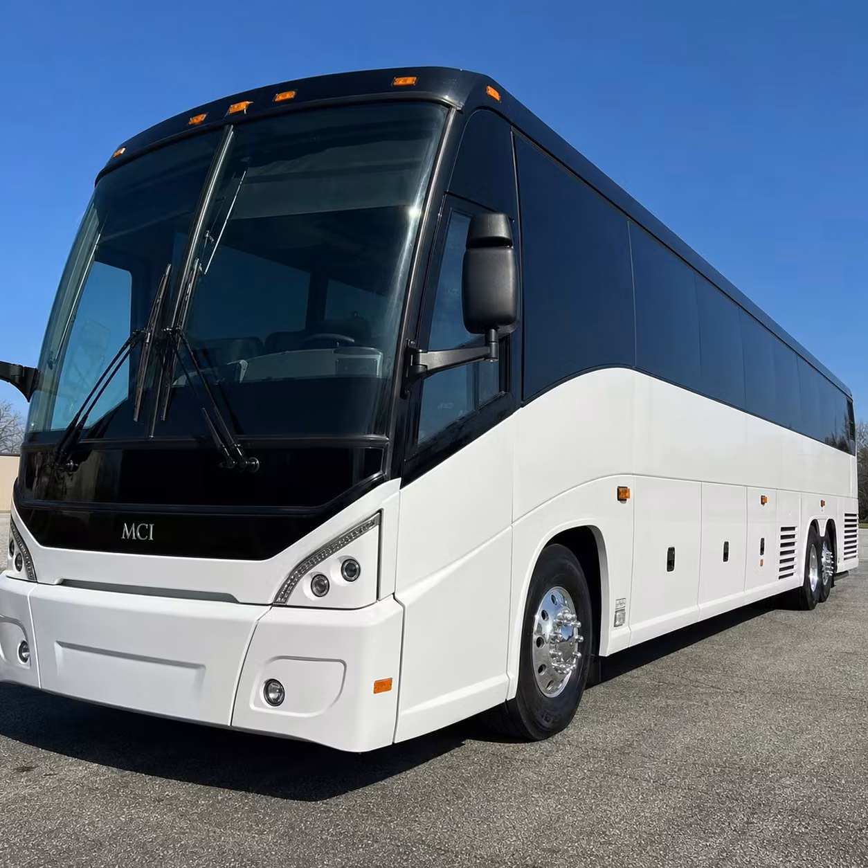 new bedford 56 passenger charter bus rental